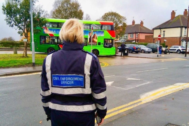 Civil Enforcement Officer at work (image reused from <a href="https://southleedslife.com/success-for-civil-enforcement-officer-in-beeston-holbeck-and-hunslet/">South Leeds life</a>)